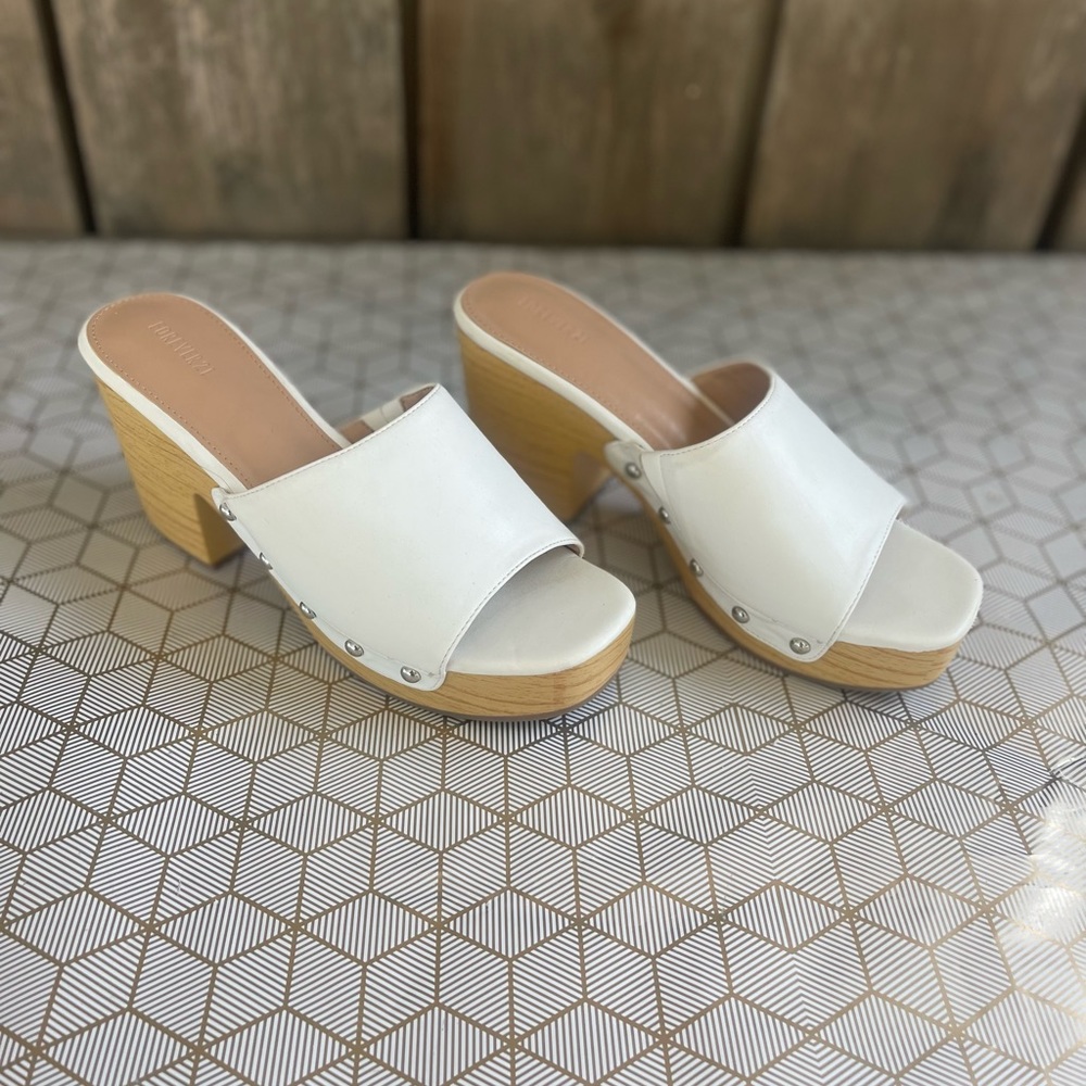 New not in box. Forever 21 white mules.